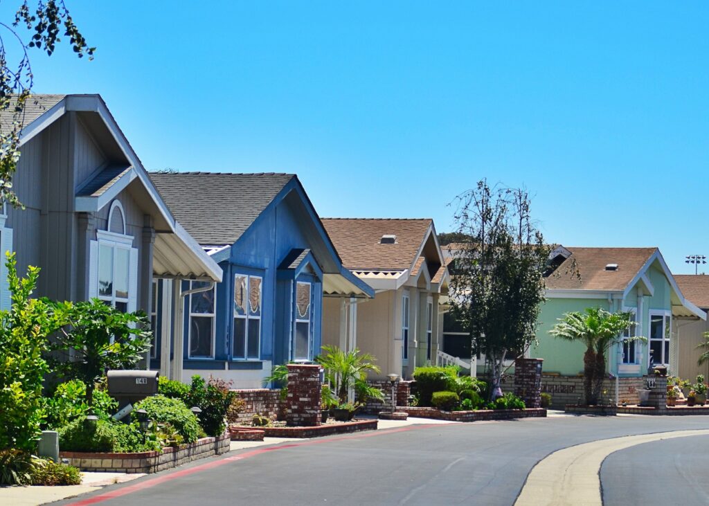 Houses lined up on a quiet suburban street in a neighborhood