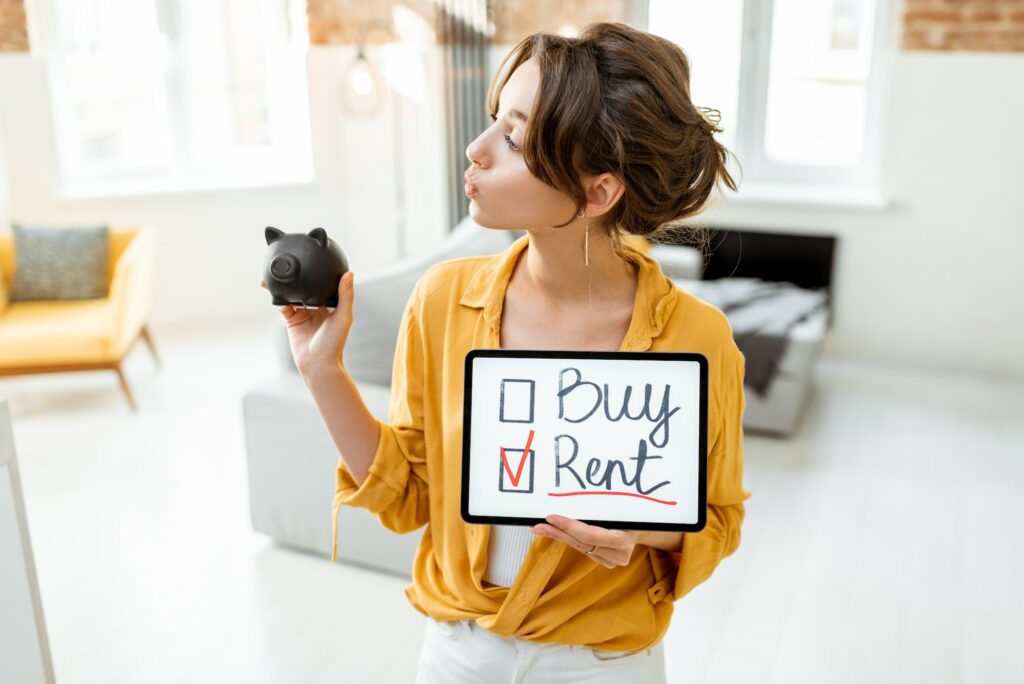 Woman decides between buying or renting house